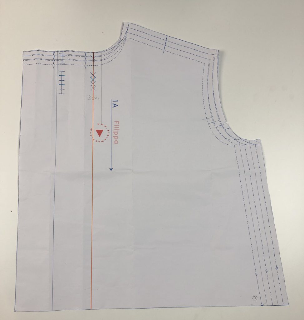 Pattern piece for front of shirt with an orange line marking the centre front line