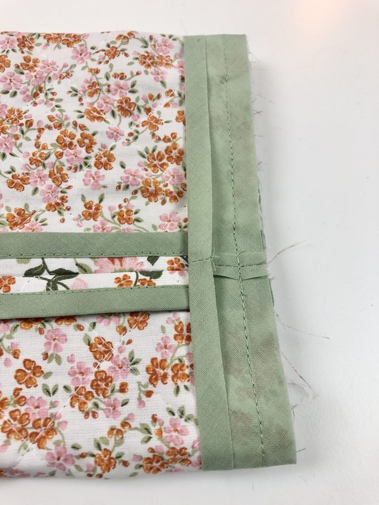 bias binding attached to the lower edge of the sleeve