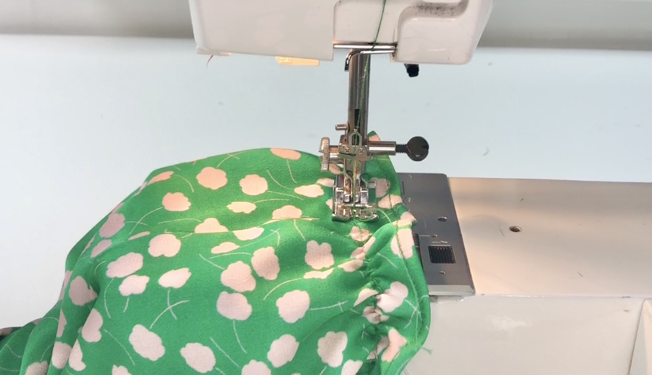working shirring in the round on green fabric