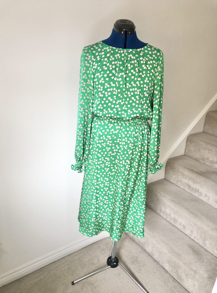 green dress with long sleeves