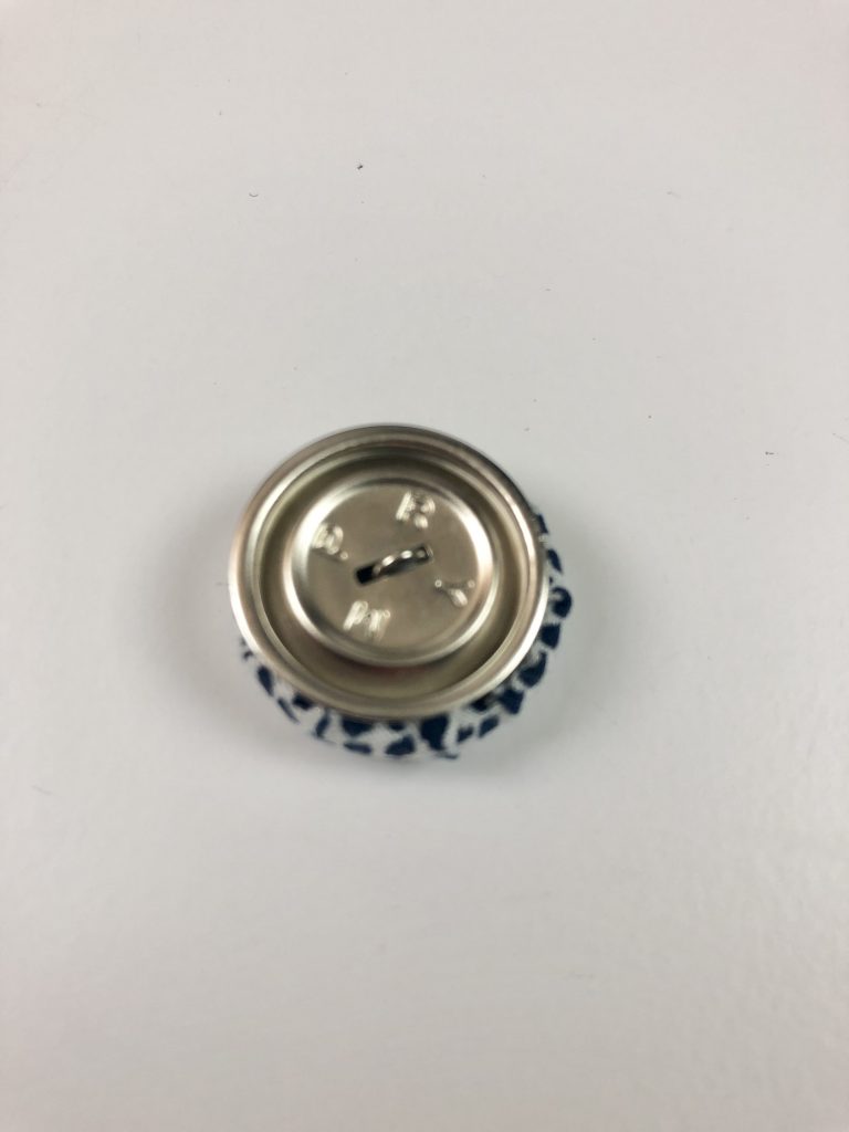 bottom part of button attached
