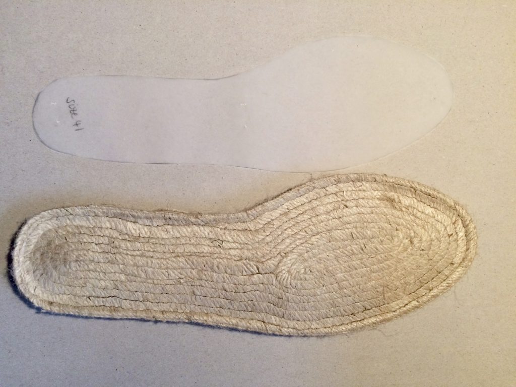 paper pattern next to base of shoe
