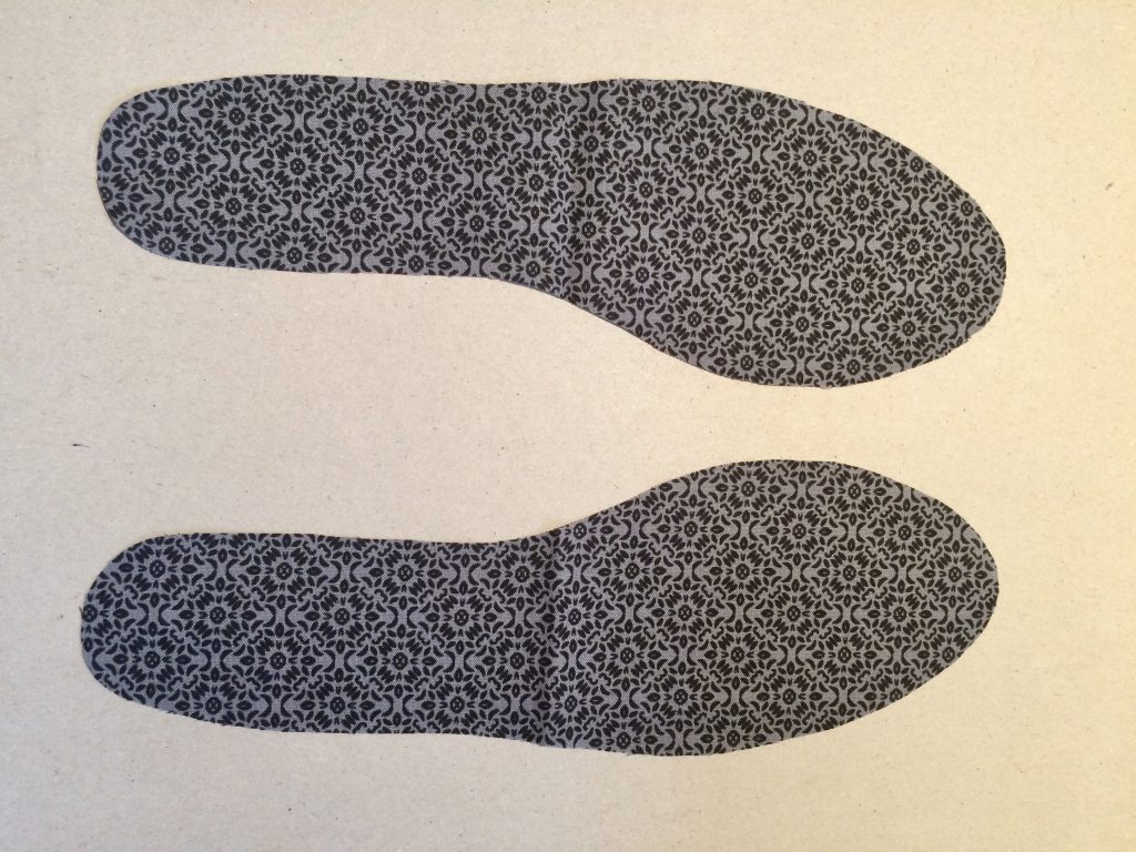 grey patterned fabric cut out using base template