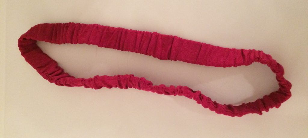 elasticated belt in pink fabric