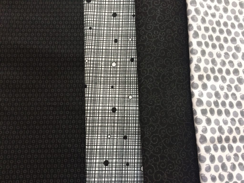 4 different fabrics purchased at Joannes