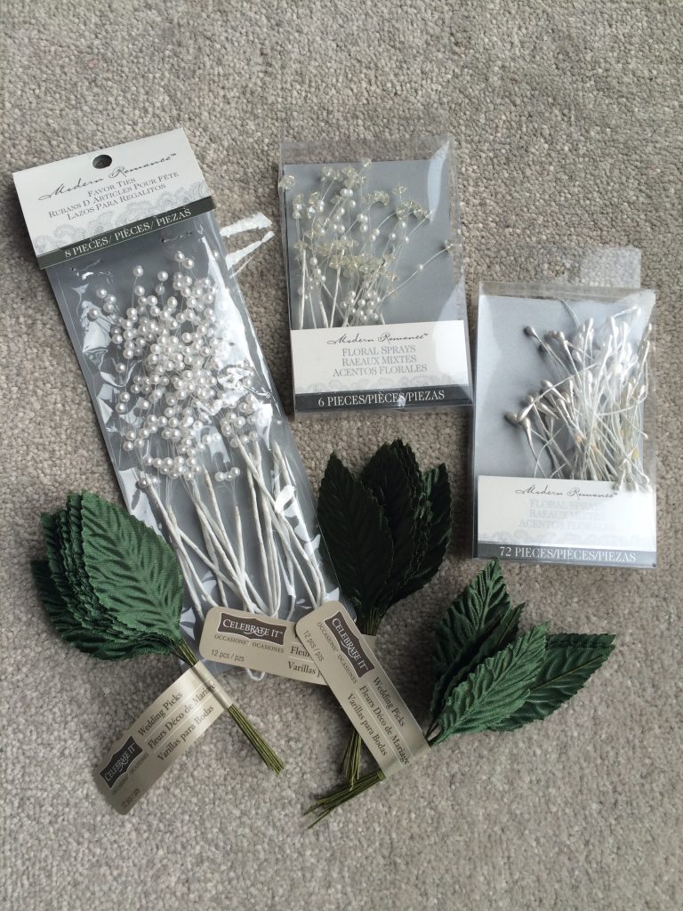 fake leaves and beading to use for wedding flowers