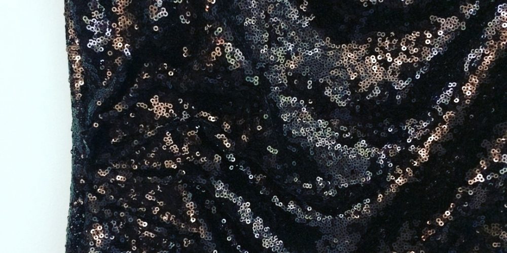 close up on black sequin dress
