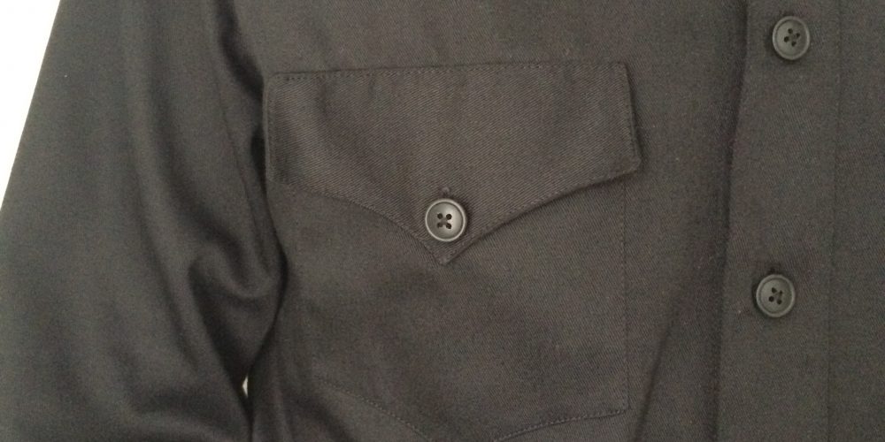 Close up of black western shirt front